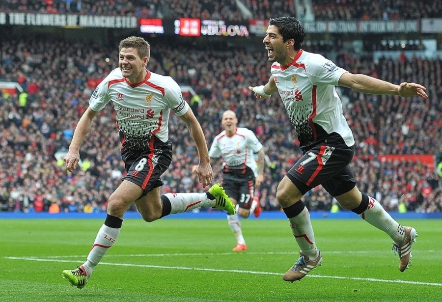 Suarez và Gerrard từng là đồng đội ở Liverpool (Ảnh: Getty).